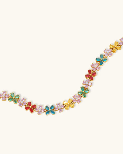Ausgelegtes Gold-Armband mit mehrfarbigen Blüten aus Zirkonia