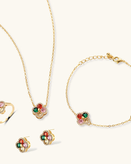 Kleeblatt-Schmuckset in Gold mit Ring, Halskette, Armband und Ohrringen, besetzt mit bunten Zirkonia