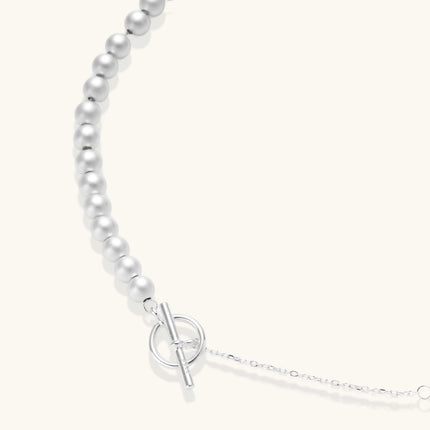 Lange Kugelkette aus 925 Silber mit Silberkugeln im Verlauf und Knebelverschluss