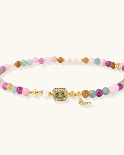 Ausgelegtes Armband mit Edelsteinen in Rosa, Flieder, Mint und Blau sowie Süßwasserperlen